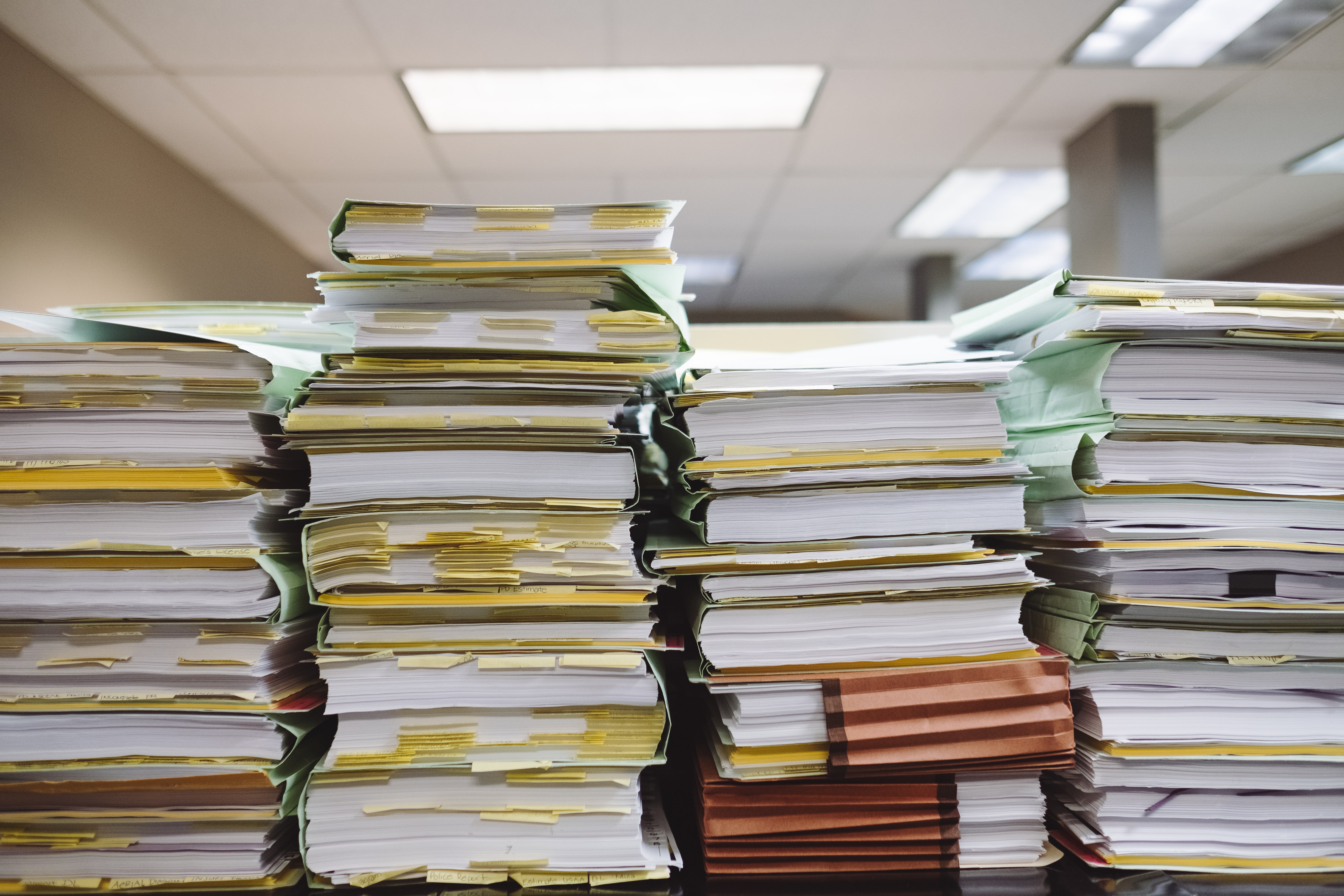 Stacks of paperwork in an office